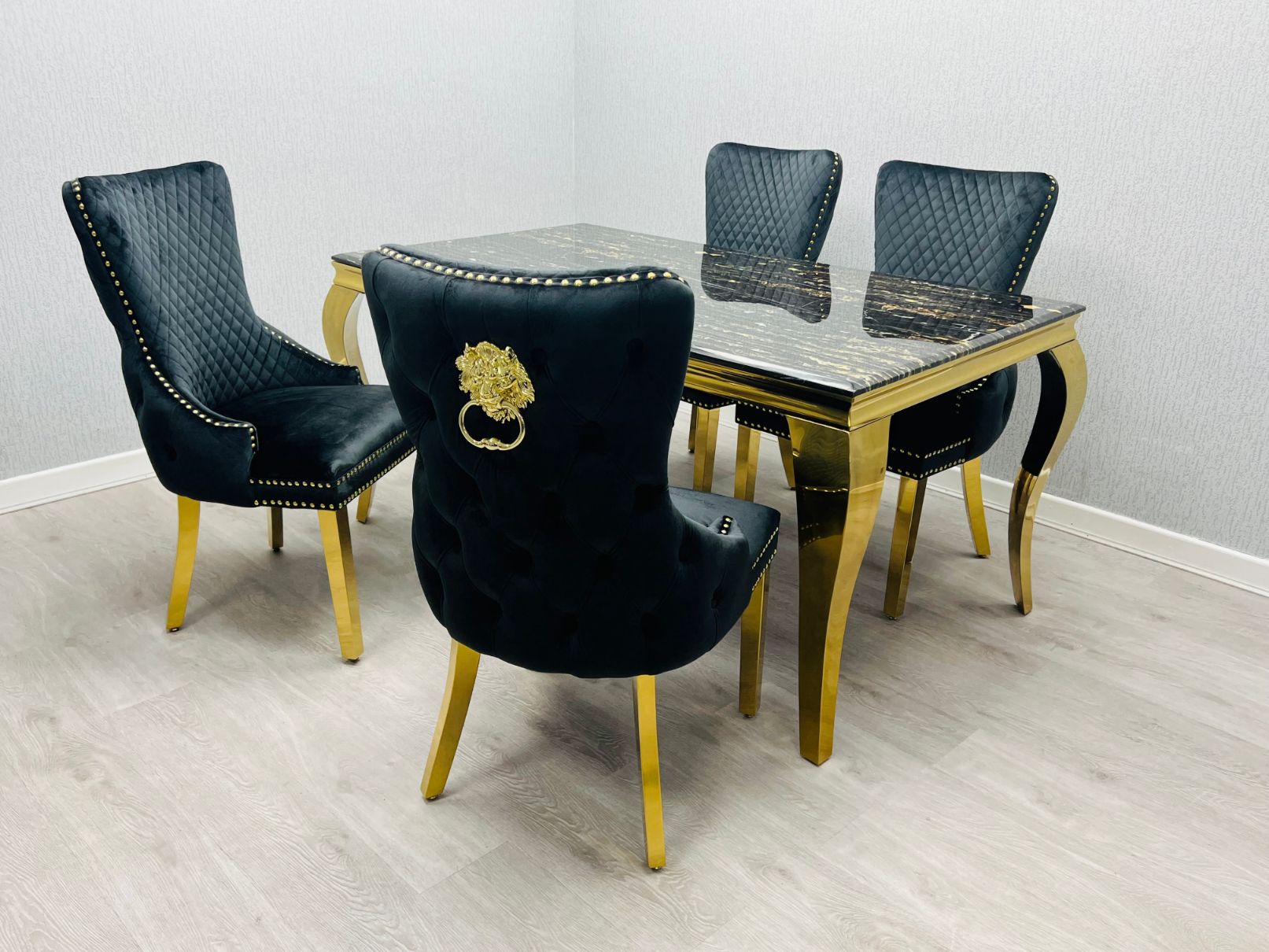 Louis Gold Black Marble Dining Table With Shimmer Black / Gold Lion Knocker Dining Chairs