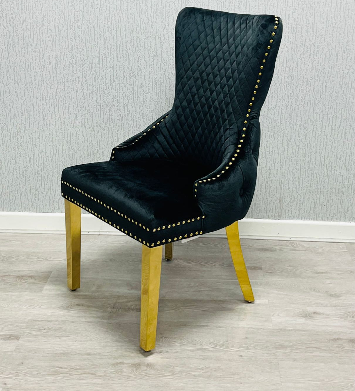 Sofia Black & Gold Marble Dining Table with Victoria Lion Knocker Chairs