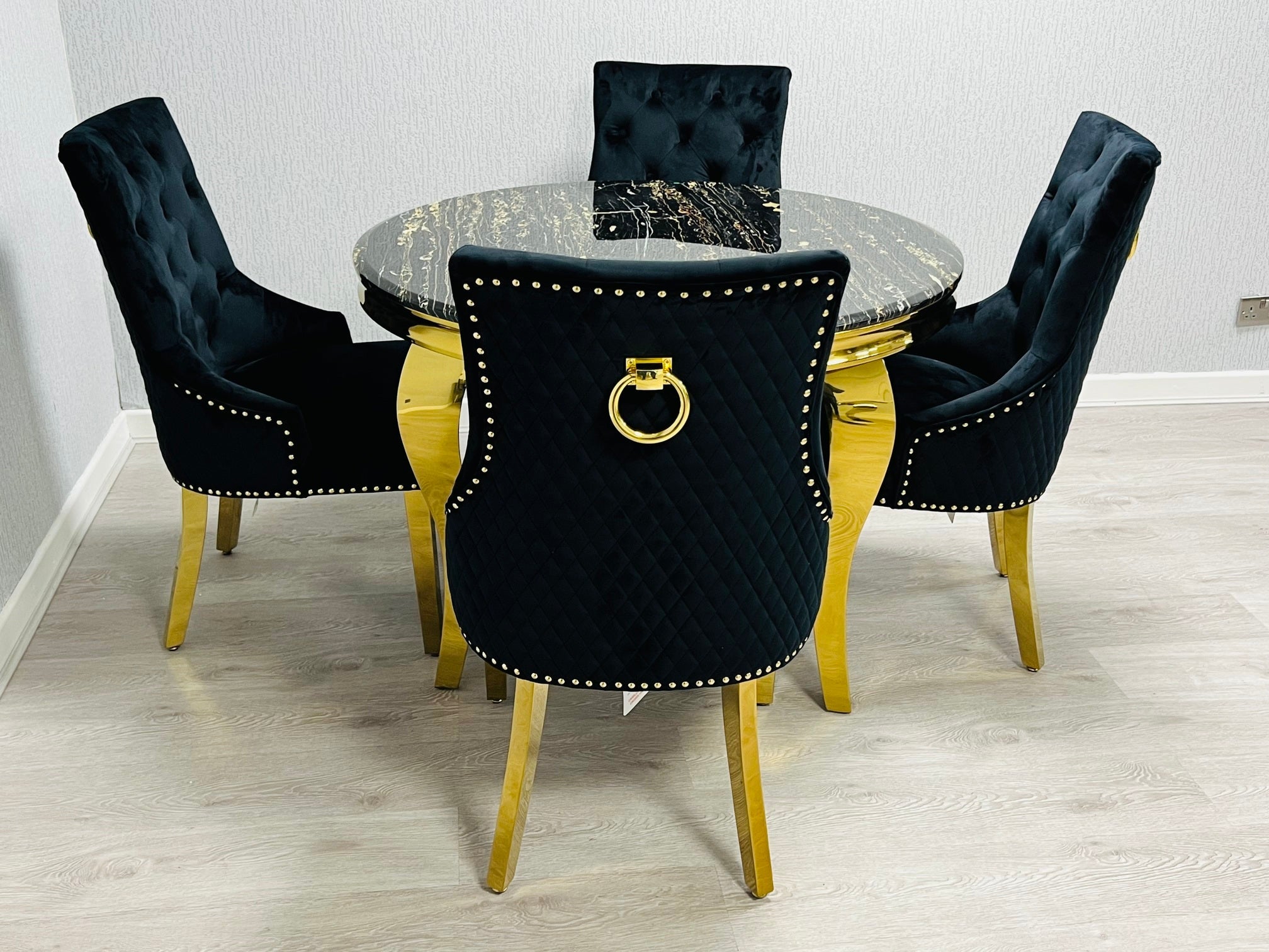 Sofia Black Gold Marble Dining Table with Majestic Black Gold Knocker Chair